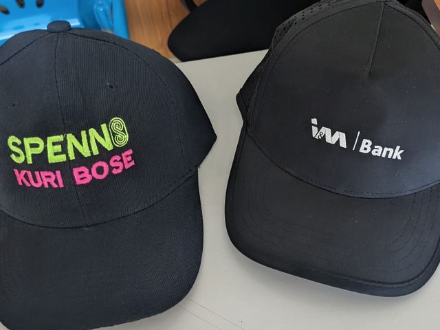 Branded caps embroidered in house