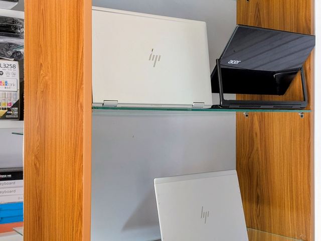 HP and Acer laptops on our display shelves